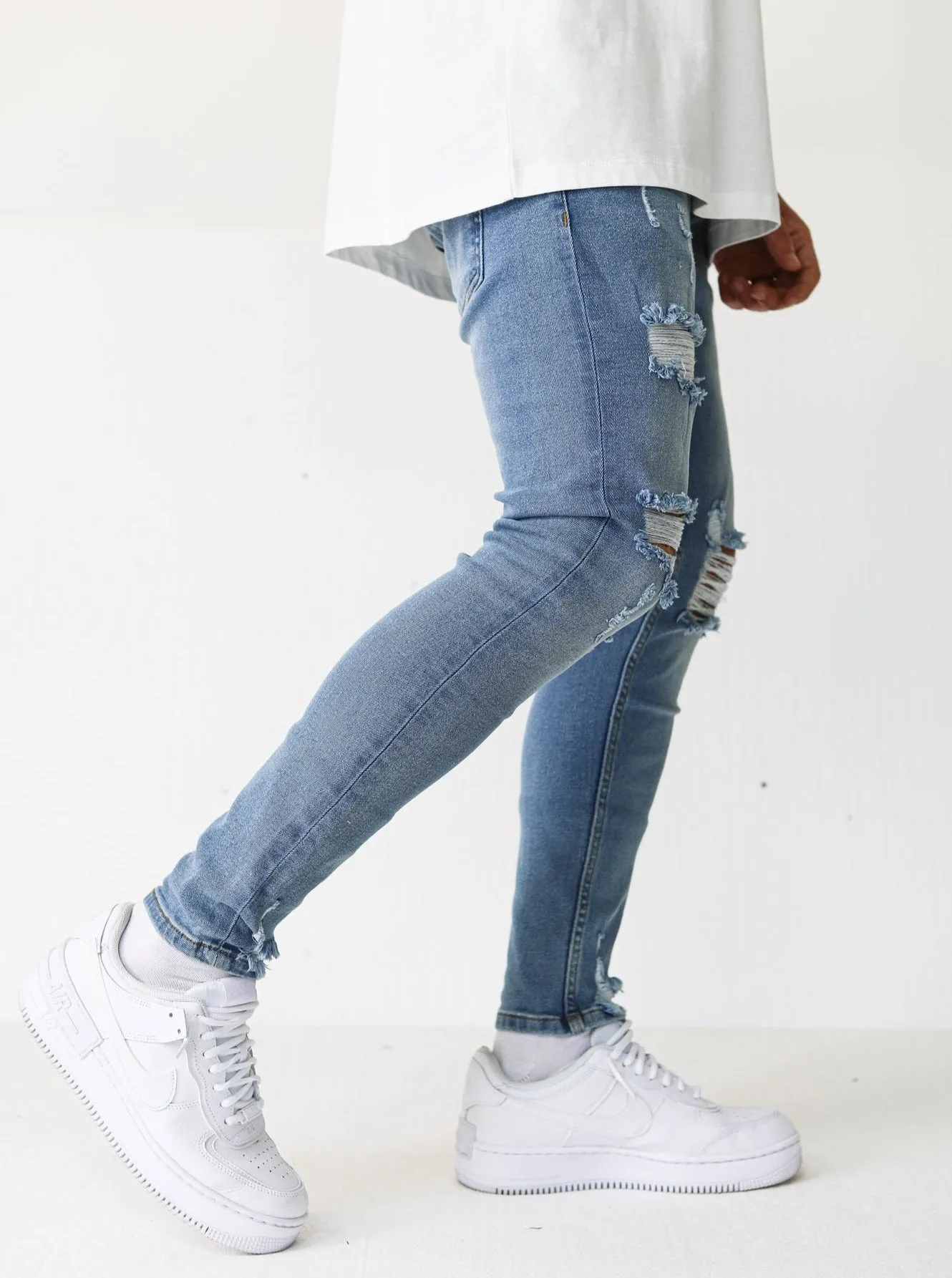 Distressed Ripped Light Blue Jeans