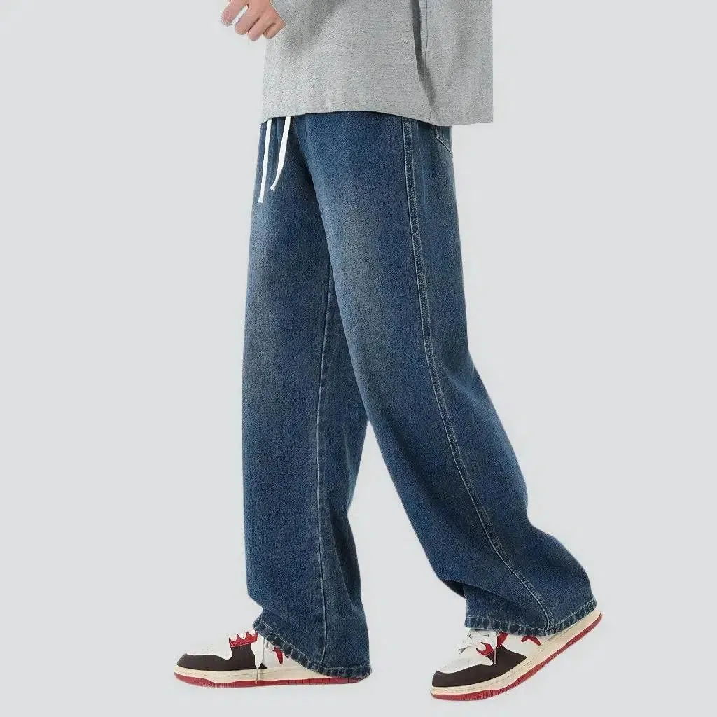 Elevated men's waistline jeans